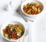 Low-fat turkey bolognese in two white bowls