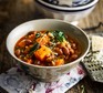 Pumpkin and bean soup in bowl