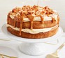 Easy caramel cake served on a cake stand