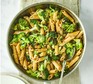 A saucepan with charred broccoli, lemon & walnut pasta