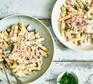Creamy salmon pasta in two bowls