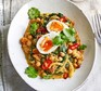 Curried spinach, eggs & chickpeas served on a plate