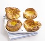 Gluten-free Yorkshire puddings in a baking tray