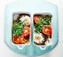 Two bowls of mushroom baked eggs and tomatoes