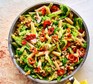 Penne with cabbage & walnuts in a large bowl