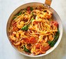 Prawn & harissa spaghetti served in a bowl