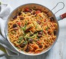 Spaghetti puttanesca served in a pan