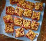 Plum & raspberry crumble bars cut into squares