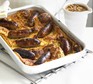 Golden toad-in-the-hole on a wire rack