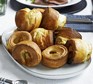 Yorkshire puddings piled on a plate