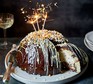 Rocky road cheesecake pudding with sparklers in the top